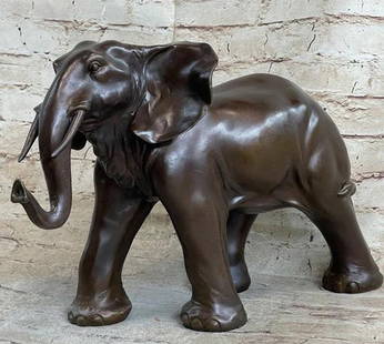Wandering Wild Elephant Bronze Statue - 11" x 16": Wandering Wild Elephant Bronze Statue - 11&#34; x 16&#34;   This captivating bronze sculpture challenges conventional perceptions of elephants, inviting viewers to appreciate their elegance and beauty