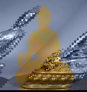 Gilded Copper Medicine Buddha Statue: Gilded Copper Medicine Buddha Statue This exquisite antique statue of the Medicine Buddha embodies healing and compassion, crafted from rare pure copper with a rich gilt finish. Meticulously detailed,