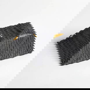 Revealed' Cast Glass Sculpture by Deborah Timperley: &#39;Revealed&#39; Cast Glass Sculpture by Deborah Timperley   Revealed is a black cast glass sculpture shaped like a four-sided, cut-off pyramid, wrapped in textured fabric-cast glass. The covering i