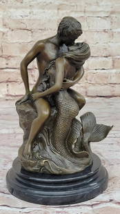 Enchanted Lovers Bronze Sculpture with Marble Base - 10" x 6": Enchanted Lovers Bronze Sculpture with Marble Base - 10&#34; x 6&#34; This captivating bronze sculpture depicts the tender yet forbidden love between a mermaid and a mortal man, entwined in a passiona