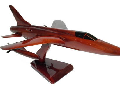 Handcrafted Wooden F-105 Thunderchief Model: Handcrafted Wooden F-105 Thunderchief Model   This all-wood model replicates the iconic F-105 Thunderchief, a Mach 2 capable supersonic fighter-bomber used by the U.S. Air Force during the Vietnam War