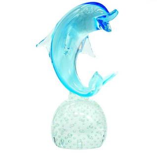Playful Blue Dolphin on Base Murano Glass Sculpture: Playful Blue Dolphin on Base Murano Glass Sculpture  Discover the allure of the ocean with our Exclusive Clear Glass Dolphin on Base Murano Glass Sculpture. Handmade by skilled artisans, this unique g