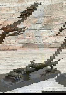 Rise of the Dragon Bronze Sculpture: Rise of the Dragon Bronze Sculpture  This striking bronze sculpture, bearing the signature of artist Fisher, depicts a slender Chinese dragon rising powerfully on its hind legs, embodying grace, energ