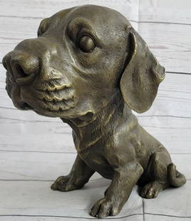 Bobble Head Dog Bronze Statue: Bobble Head Dog Bronze Statue  Full of charm and whimsy, this delightful bronze statue features a floppy-eared dog with a bobble head design that adds playful movement to its sweet expression. Crafted