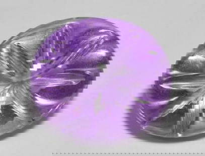 Iris Violet Amethyst Oval Gemstone with Intricate Flower Carving: Iris Violet Amethyst Oval Gemstone with Intricate Flower Carving  This exquisite loose gemstone is a carved oval of rich iris violet amethyst, featuring a finely detailed flower delicately sculpted wi