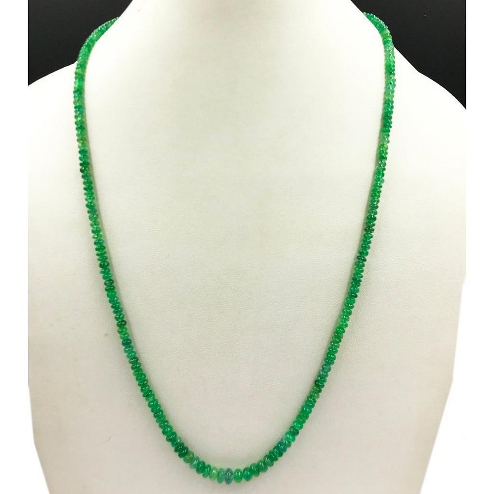 Emerald String Necklace: Emerald String Necklace Gemstone Diameter: 3.3mm - 5.5mm Length of Necklace: 47cm Weight in Carats: 50.04 View Photos For Further Details