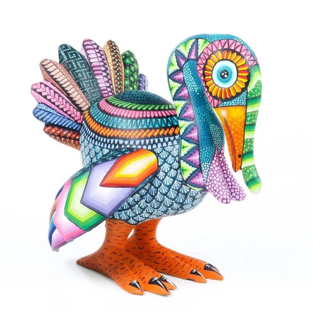 Radiant Turkey – Handcrafted Oaxacan Alebrije by the Fuentes Family: Radiant Turkey – Handcrafted Oaxacan Alebrije by the Fuentes Family This Radiant Turkey alebrije is a masterful example of Oaxacan wood carving, created by the celebrated Fuentes family in Oaxaca, M