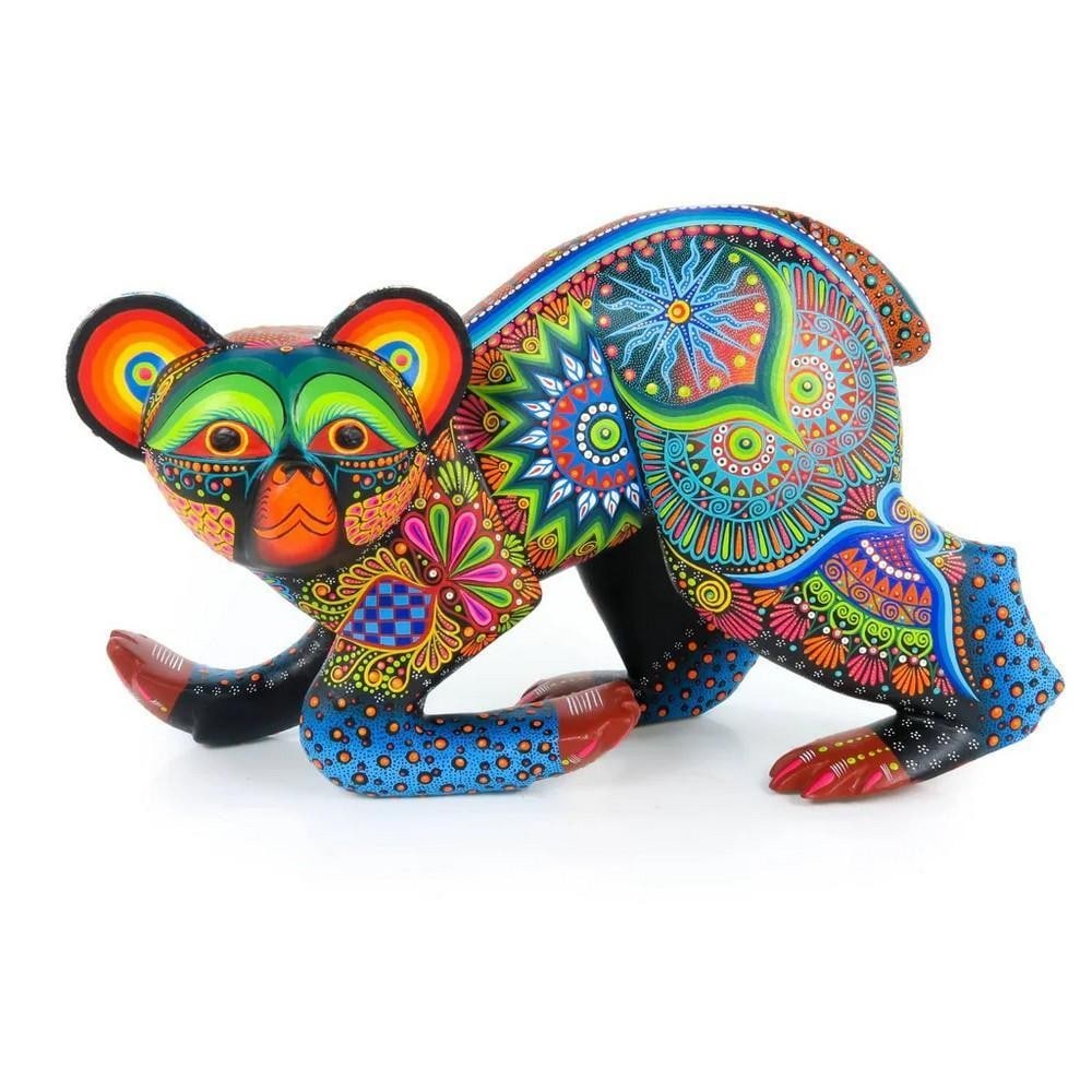 Majestic Black Bear – Oaxacan Alebrije Wood Carving: Majestic Black Bear – Oaxacan Alebrije Wood Carving This striking black bear alebrije is a masterful creation from the renowned Sosa family workshop in Oaxaca, Mexico. Expertly hand-carved from copa