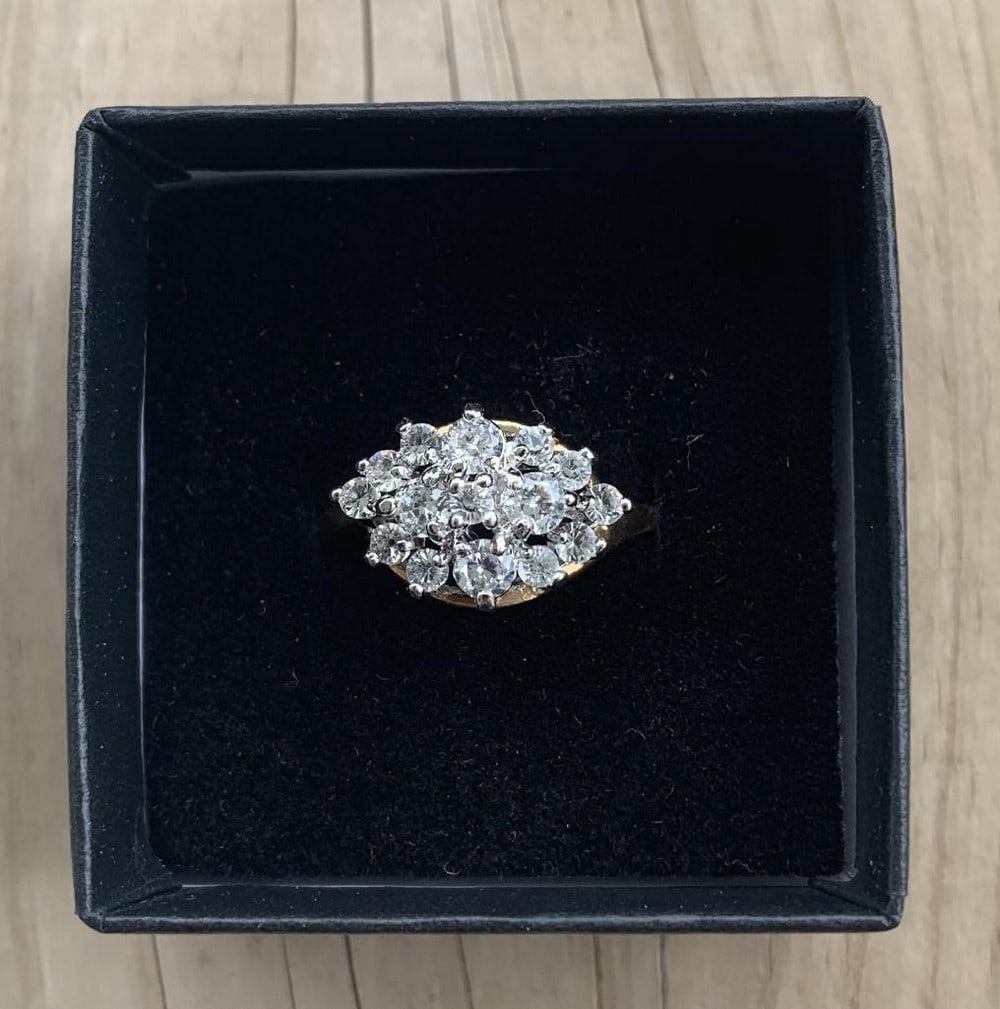 Radiant Glow Ring: Radiant Glow Ring The Radiant Glow Ring captures the essence of timeless elegance with a brilliant Swarovski crystal that shimmers with every movement. Set in a sleek, polished band and finished in ra