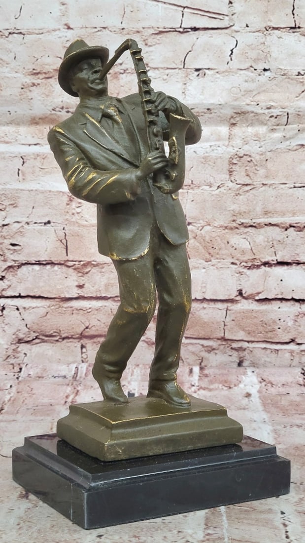 Jamming Saxophone Original Bronze Sculpture - 12" x 6": Jamming Saxophone Original Bronze Sculpture - 12" x 6" Celebrate the rhythm and soul of jazz with this signed bronze saxophone player sculpture by artist Williams. Capturing a folk-inspired f