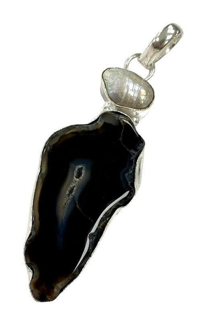 Freshwater Pearl With 2.8" Black Botswana Agate Pendant: Freshwater Pearl With 2.8" Black Botswana Agate Pendant Black Botswana Agate is said to give strength, emotional balance, & stability. It is also said to be the ultimate bringer of peace desp