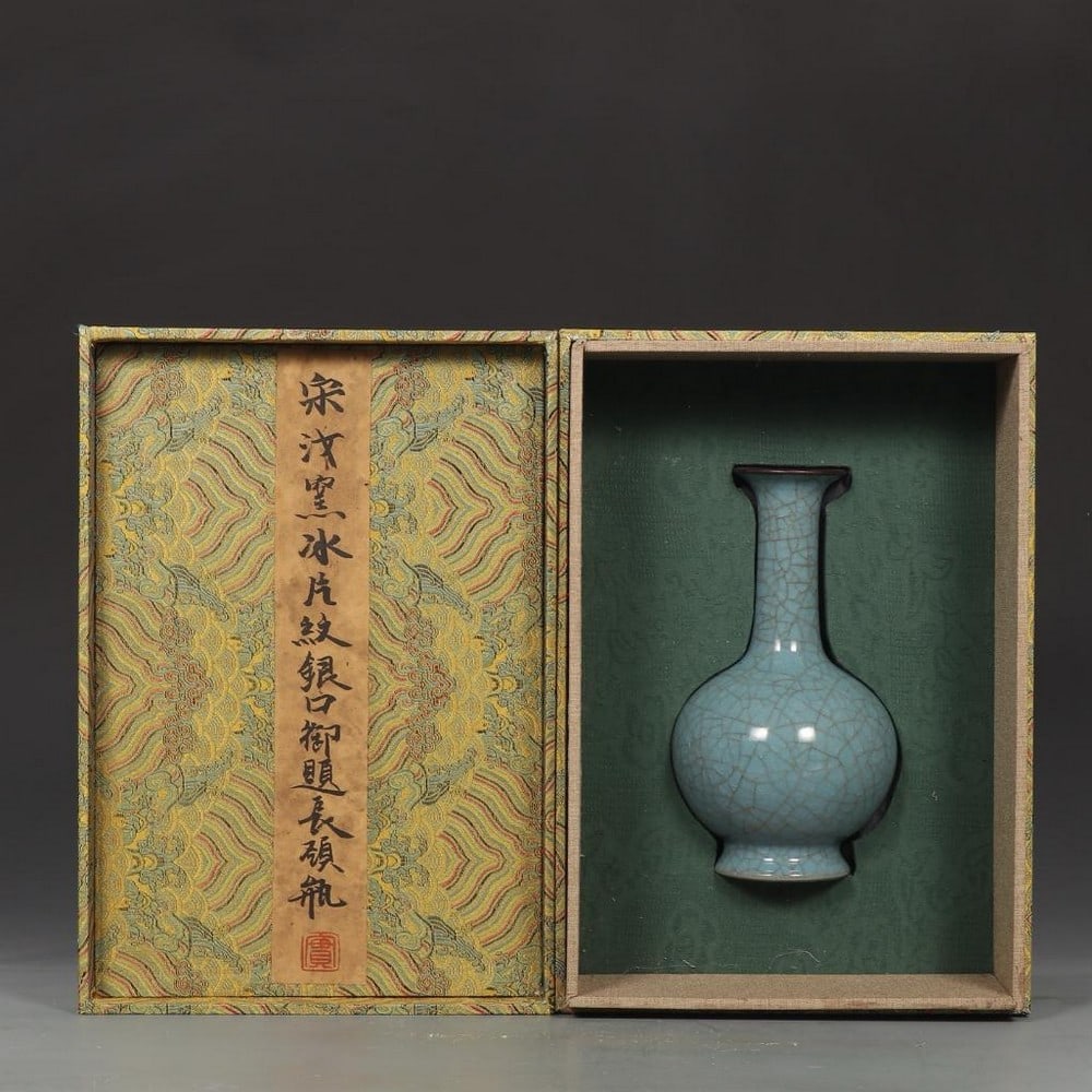 Old Collection Song Ru Kiln Silver-Necked Flask: Borneol Pattern Glaze: Old Collection Song Ru Kiln Silver-Necked Flask: Borneol Pattern Glaze This elegant flask, from an old collection, is attributed to the revered Song dynasty Ru kiln and features a subtle yet captivat