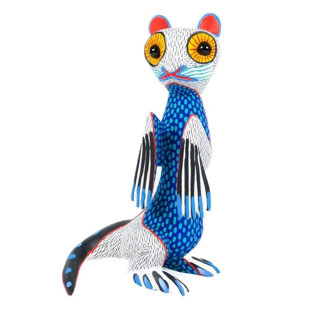 White Marble-Eyed Otter – Hand-Carved Oaxacan Alebrije by Arsenio Morales: White Marble-Eyed Otter – Hand-Carved Oaxacan Alebrije by Arsenio Morales From the heart of Oaxaca, this enchanting otter alebrije bursts with soul and craftsmanship. Hand-carved from copal wood by 