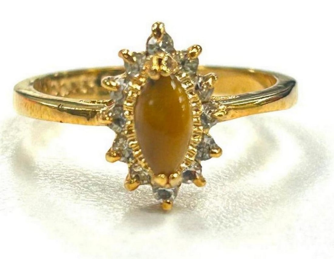 Radiant Citrine Gemstone Encased in Austrian Crystals 18KTGP Ring Size 9: Radiant Citrine Gemstone Encased in Austrian Crystals 18KTGP Ring Size 9 Citrine is a gemstone that is thought to improve creativity, activate intuition, and help with manifestation of abundance and