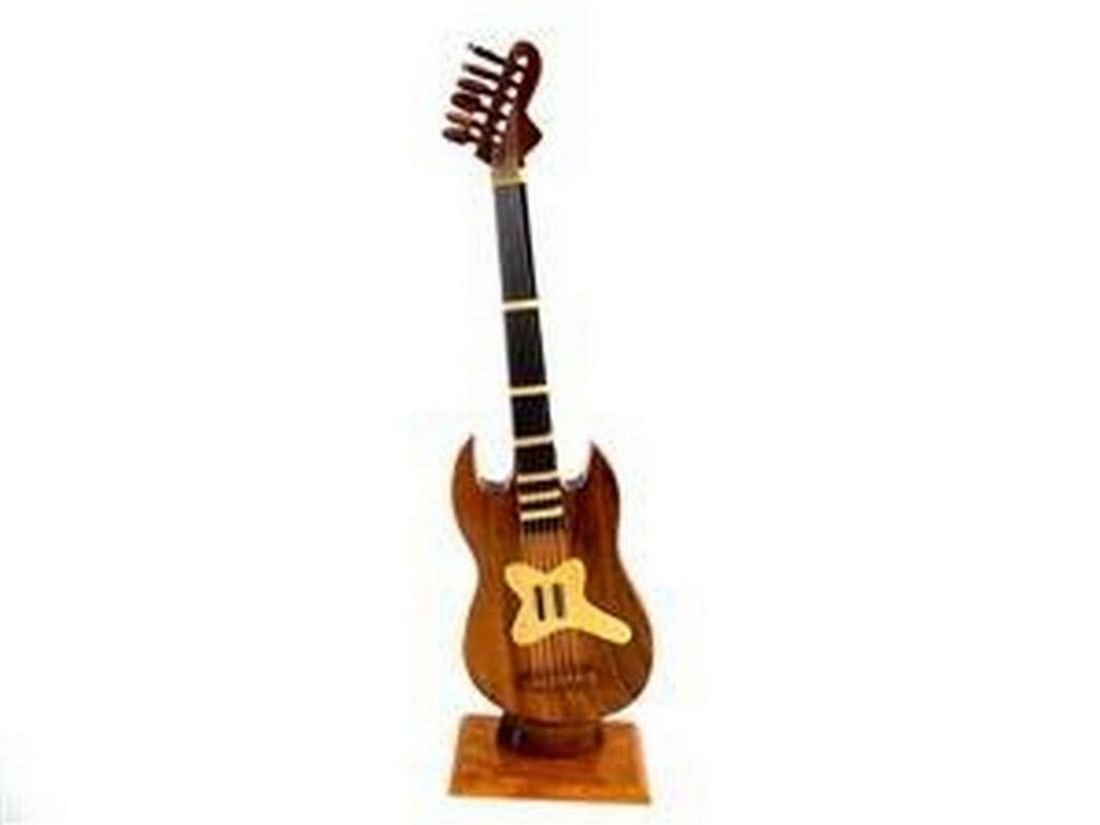 Bass Guitar: Bass Guitar This Bass Guitar is hand crafted from solid Mahogany and would make a perfect gift for any musician. Dimensions: 12" tall x 3.5" wide View photos for further details.