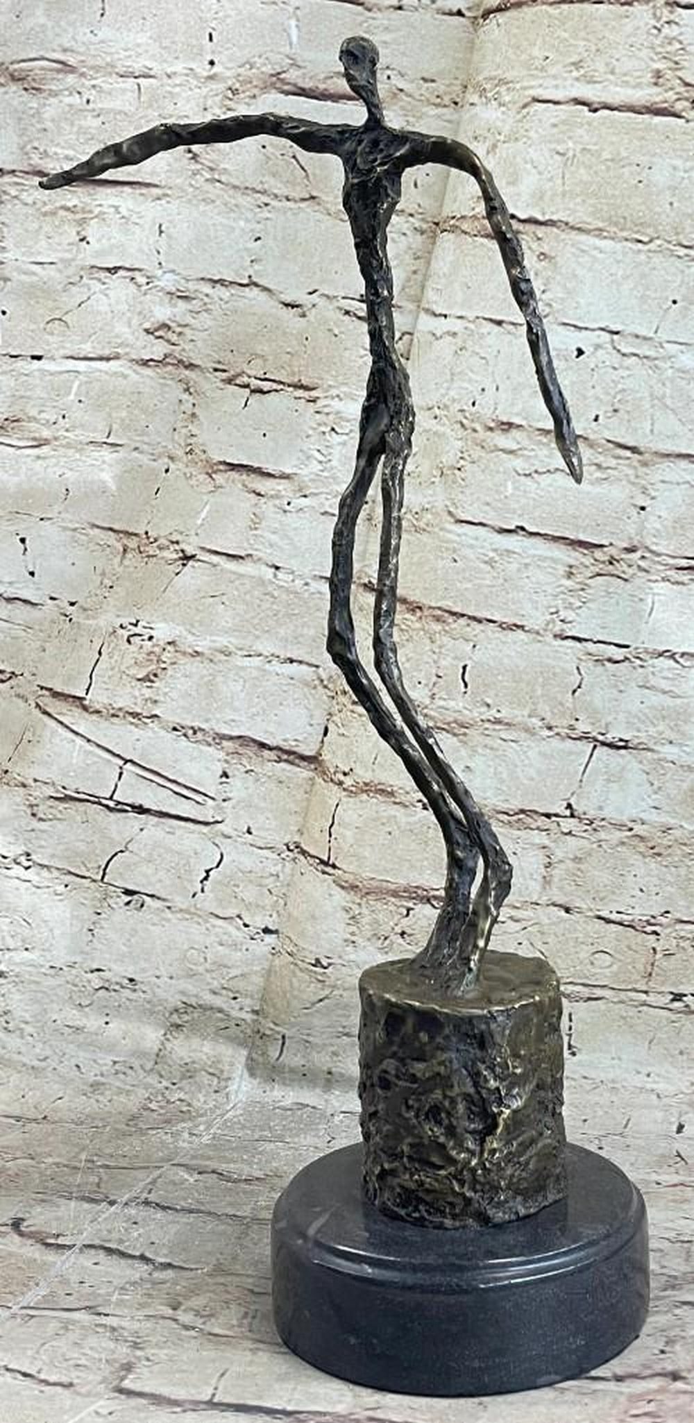 Unique Abstract Bronze Figurine w Long Outstretched Limbs: Unique Abstract Bronze Figurine w Long Outstretched Limbs This is a very unique abstract of a man standing up. He appears to have all his organs out but its just the way the artist created this sculp