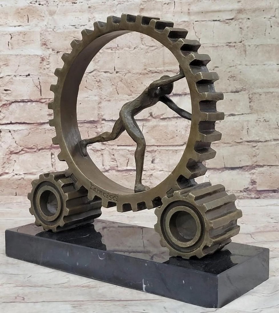 Signed Original "Cog in the Machine" Figure Pushing Gear Wheel Abstract Bronze Sculpture - 11" x 11": Signed Original "Cog in the Machine" Figure Pushing Gear Wheel Abstract Bronze Sculpture - 11" x 11" Experience the power and grace of athleticism captured in this stunning Art Deco br