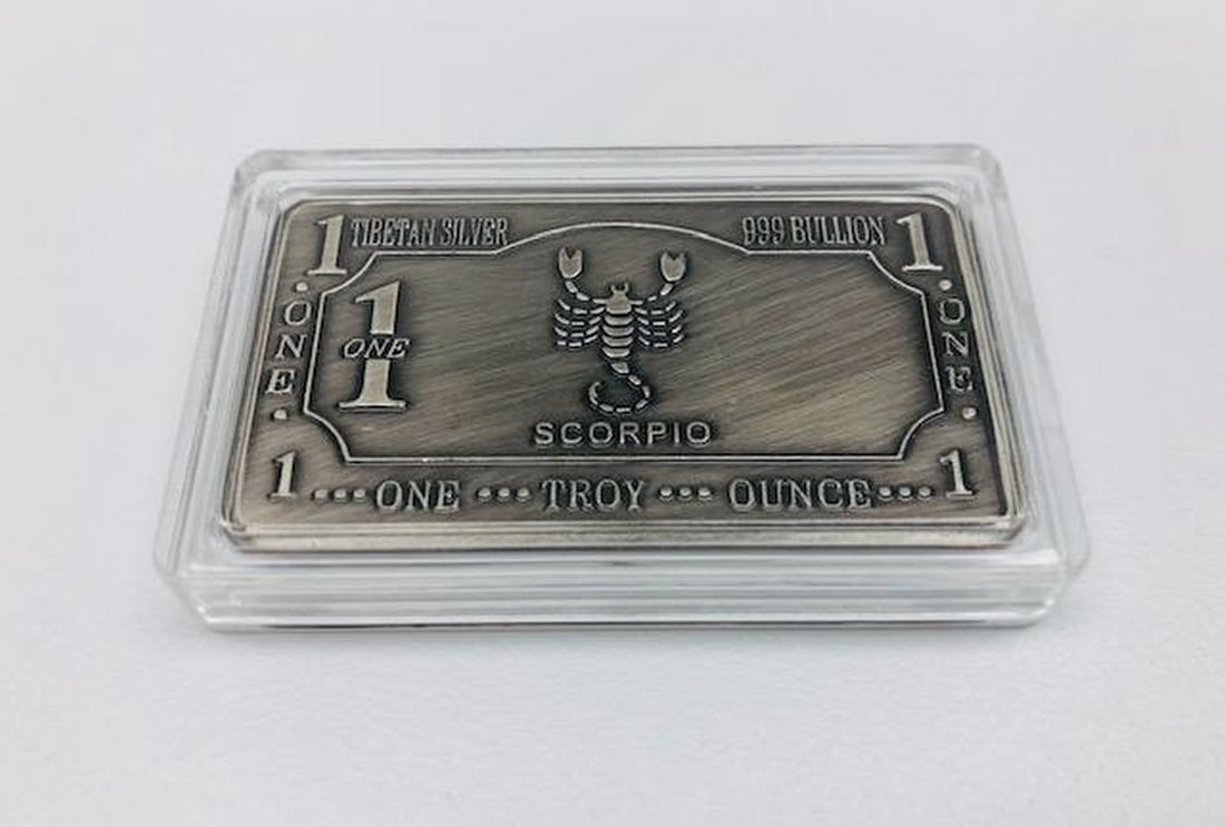 1 Troy Ounce Tibetan Silver 999 Bullion- Scorpio Zodiac Sign: 1 Troy Ounce Tibetan Silver 999 Bullion- Scorpio Zodiac Sign Dimensions: 33g, 5cm in Length, 2.8cm in Width, 3mm in Thickness. This striking piece features intricate designs that embody the intensity,