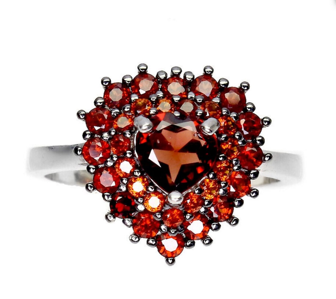 Ferocious Red Heart Mozambique Garnet Gemstone Ring - Size 9: Ferocious Red Heart Mozambique Garnet Gemstone Ring - Size 9 Whether worn as a symbol of love and devotion or as a bold fashion statement, this ring is sure to turn heads and spark conversation. Its
