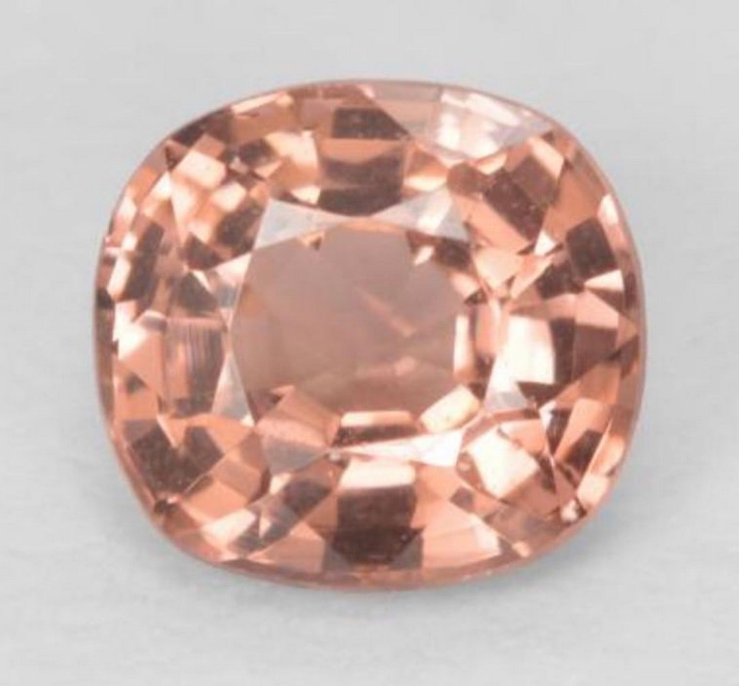 0.5ct Peach Pink Spinel Gemstone: 0.5ct Peach Pink Spinel Gemstone Size: 5 x 4.7 x 3mm Shape: Cushion Cut Colour: Medium Peach Pink Clarity: VVS-VS Untreated Origin: Tanzania Mohs Hardness: 8 View Photos For Further Detail