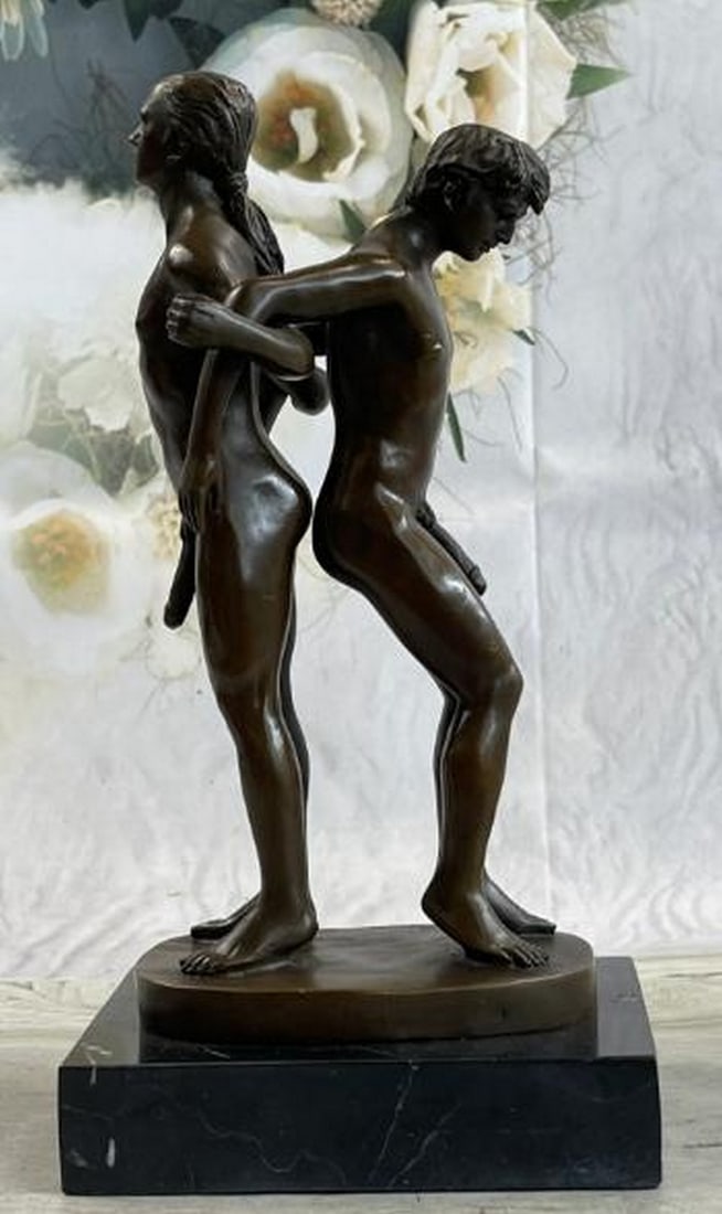 Dual Balance Bronze Sculpture of Nude Male Figures: Dual Balance Bronze Sculpture of Nude Male Figures This powerful bronze sculpture presents two nude male figures standing back to back, their arms interlocked in a gesture of unity and equilibrium. Th