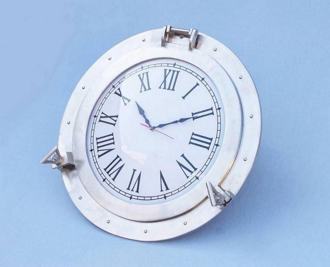 Brushed Nickel Deluxe Class Porthole Clock 24": Brushed Nickel Deluxe Class Porthole Clock 24" The Brushed Nickel Ship Porthole Clock 24" is a classy and quality accent piece to add to any nautical themed room. This charming vintage nautic