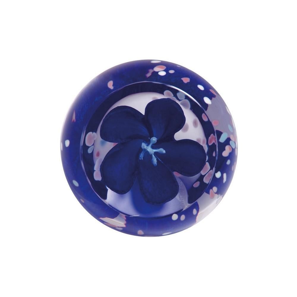 Frozen Blossom in Sapphire Paperweight: Frozen Blossom in Sapphire Paperweight A handmade glass paperweight featuring delicate blossoms in soft blue tones, created using the millefiori technique. The intricate petals and leaves gracefully e