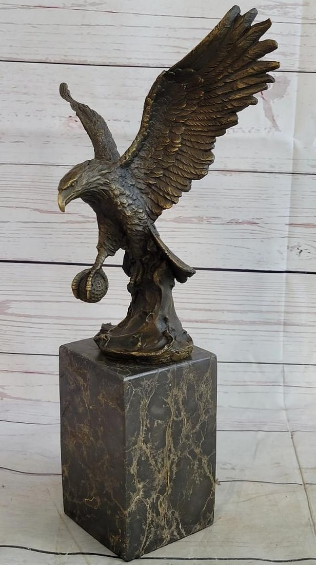 Handmade American Bald Eagle Bronze Bookend by Milo – 14" x 8": Handmade American Bald Eagle Bronze Bookend by Milo – 14" x 8" This bronze sculpture captures an American bald eagle in flight, wings extended and talons poised, exuding power, majesty, and