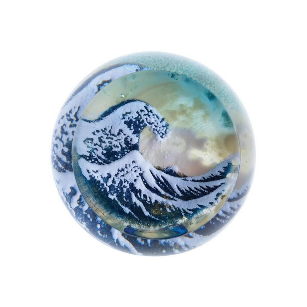 The Wave Paperweight: The Wave Paperweight A handcrafted glass paperweight inspired by Hokusai’s iconic “The Wave.” It depicts a towering wave cascading over fishing boats, with Mount Fuji visible in the backgrou