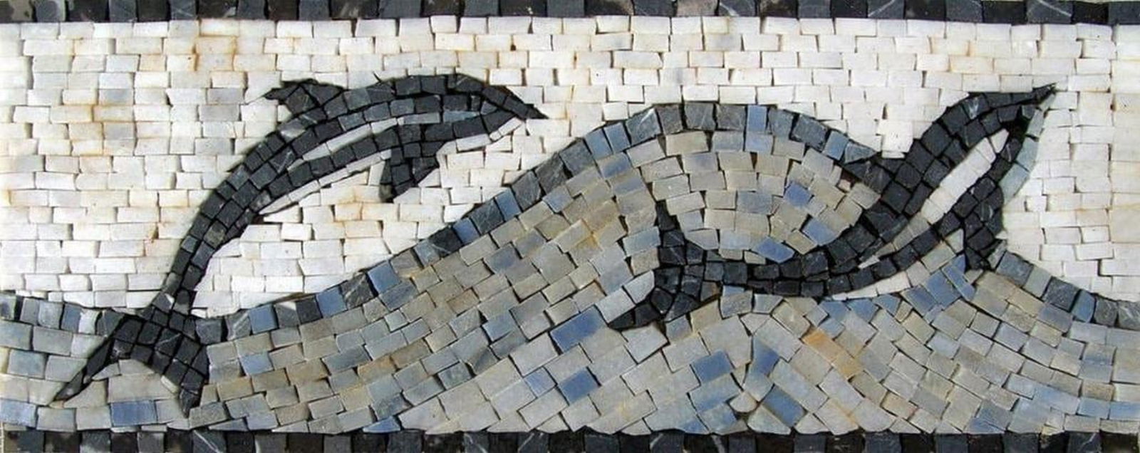 Playful Dolphins Nautical Mosaic Border: Playful Dolphins Nautical Mosaic Border A handcrafted mosaic made from natural stone, featuring a nautical-themed design with dolphins and ocean motifs. The border combines detailed tile work with vib