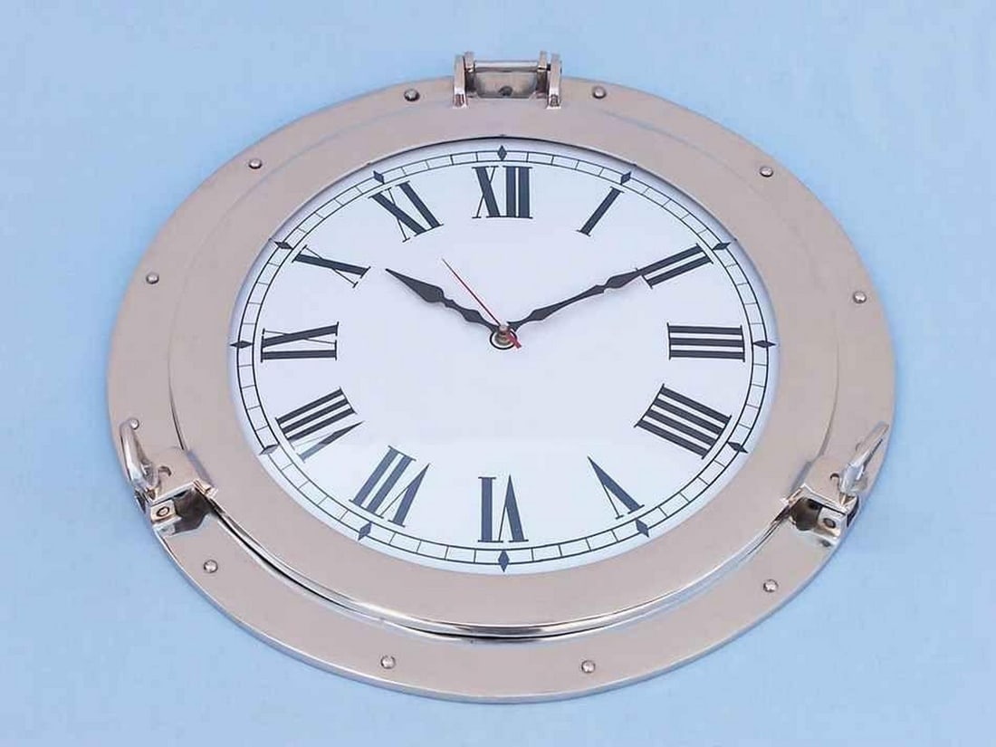 17" Polished Chrome Ship Decorative Porthole Clock: 17" Polished Chrome Ship Decorative Porthole Clock Discover the epitome of craftsmanship with our Chrome Ship Porthole Clock, meticulously handcrafted by our master artisans. This decorative timep