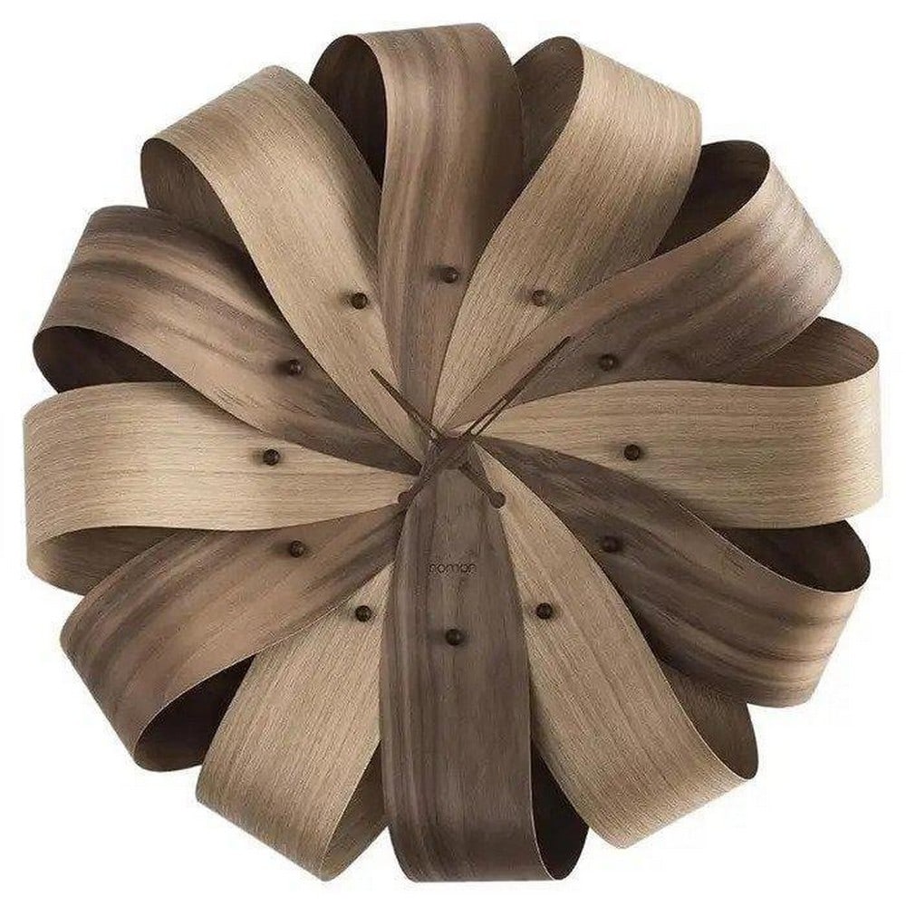 Brisa Wall Clock: This Brisa Wall Clock is a stunning and functional timepiece that seamlessly blends modern aesthetics with timeless design. Crafted with precision and attention to detail, this elegant wall clock is a