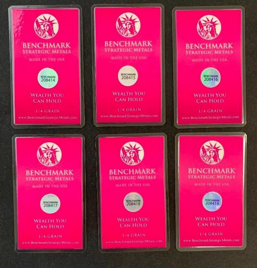 Lot of Six Benchmark 1/4 Grain .999 Fine Gold Bars in COA Cards: Lot of Six Benchmark 1/4 Grain .999 Fine Gold Bars in COA Cards This is a set of six Benchmark Certificate of Authenticity cards, each containing an encapsulated 1/4 grain .999 fine gold bar. These co
