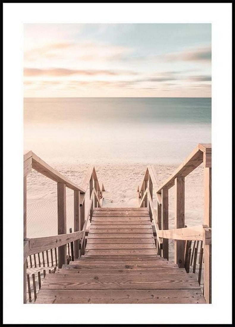 Beach At Sunrise Poster: Beach At Sunrise Poster Photograph of beach stairs in the sunrise. This amazing art print embraces a warm and welcoming feel. Bring the summer to your walls with this dreamy beach wall art. The poster