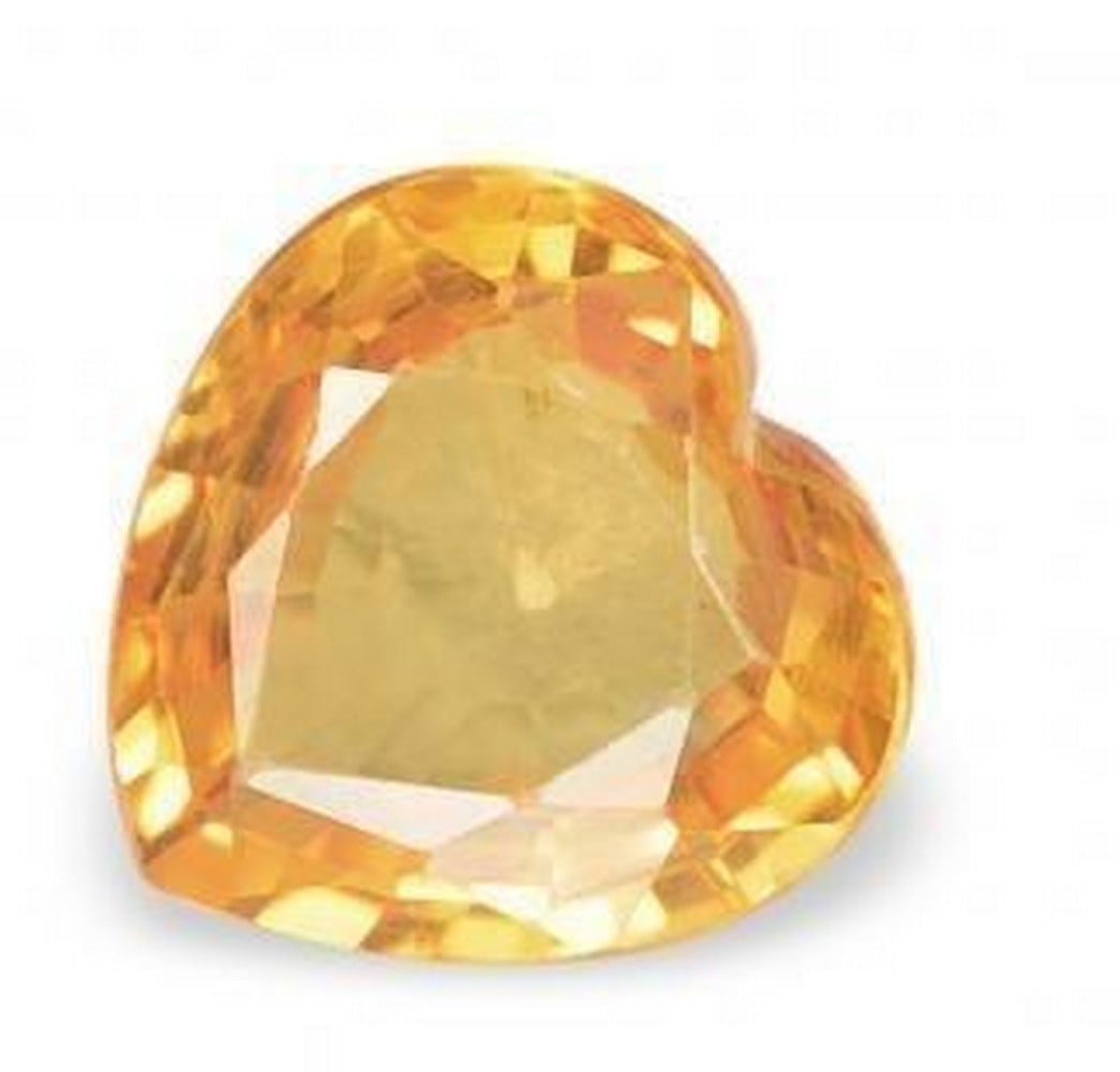 Heart-Shaped Peach Sapphire: Heart-Shaped Peach Sapphire Fall in love with this exquisite heart-shaped sapphire, showcasing a rare and enchanting peachy-orange hue. Radiating warmth and elegance, this loose gemstone combines the