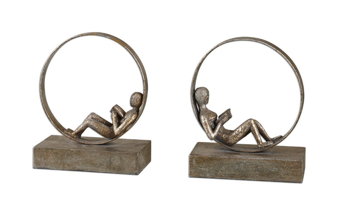 "Lounging Reader" Uttermost Collection Bookends: "Lounging Reader" Uttermost Collection Bookends These whimsical bookends boast an antiqued silver leaf finish enhanced by a delicate light gray glaze. Dimensions: Width / Diameter: 8.00"