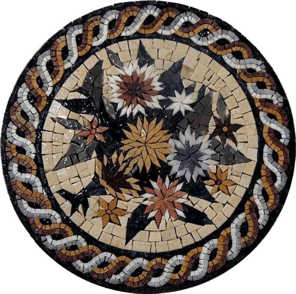 Bloom Pattern Mosaic Medallion: Bloom Pattern Mosaic Medallion A handcrafted mosaic artwork made from natural stone. The design features a circular medallion with floral-inspired patterns, created from hand-cut stone tiles arranged