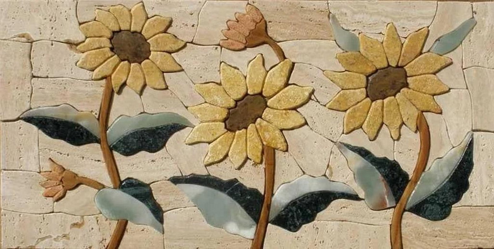 Sunflowers Mosaic Art: Sunflowers Mosaic Art A handcrafted mosaic made from natural stone, featuring a vibrant sunflower design. The piece showcases carefully arranged tiles that create a textured and visually engaging surf