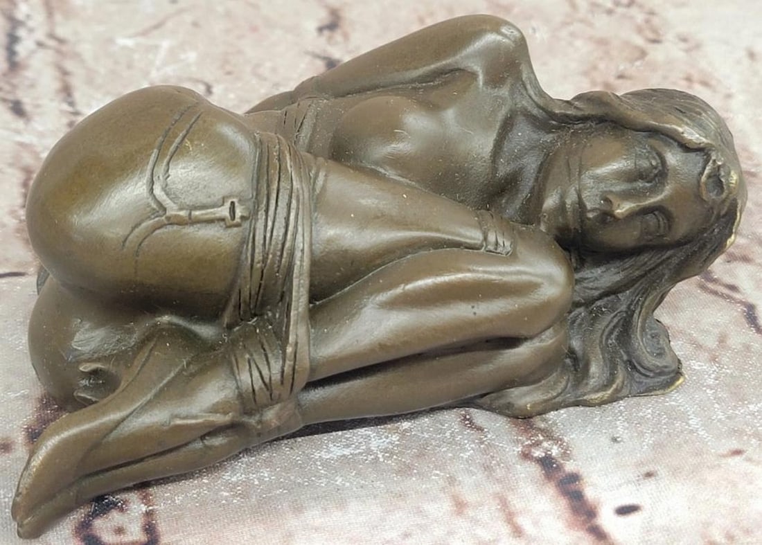 Art Deco Erotic Bronze Sculpture - 2" x 4.5": Art Deco Erotic Bronze Sculpture - 2" x 4.5" This striking bronze sculpture draws inspiration from the Art Deco movement, portraying a nude female figure in a bondage-inspired pose that exudes