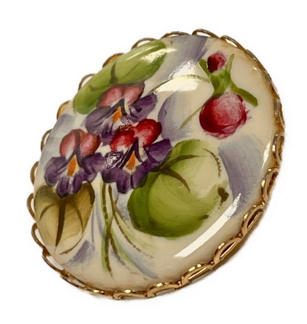 Gold Frame Hand Painted Ceramic Floral Brooch: Gold Frame Hand Painted Ceramic Floral Brooch Introducing our Gold Frame Hand Painted Ceramic Floral Brooch—a wearable masterpiece that seamlessly fuses classic elegance with artisanal craftsmanshi