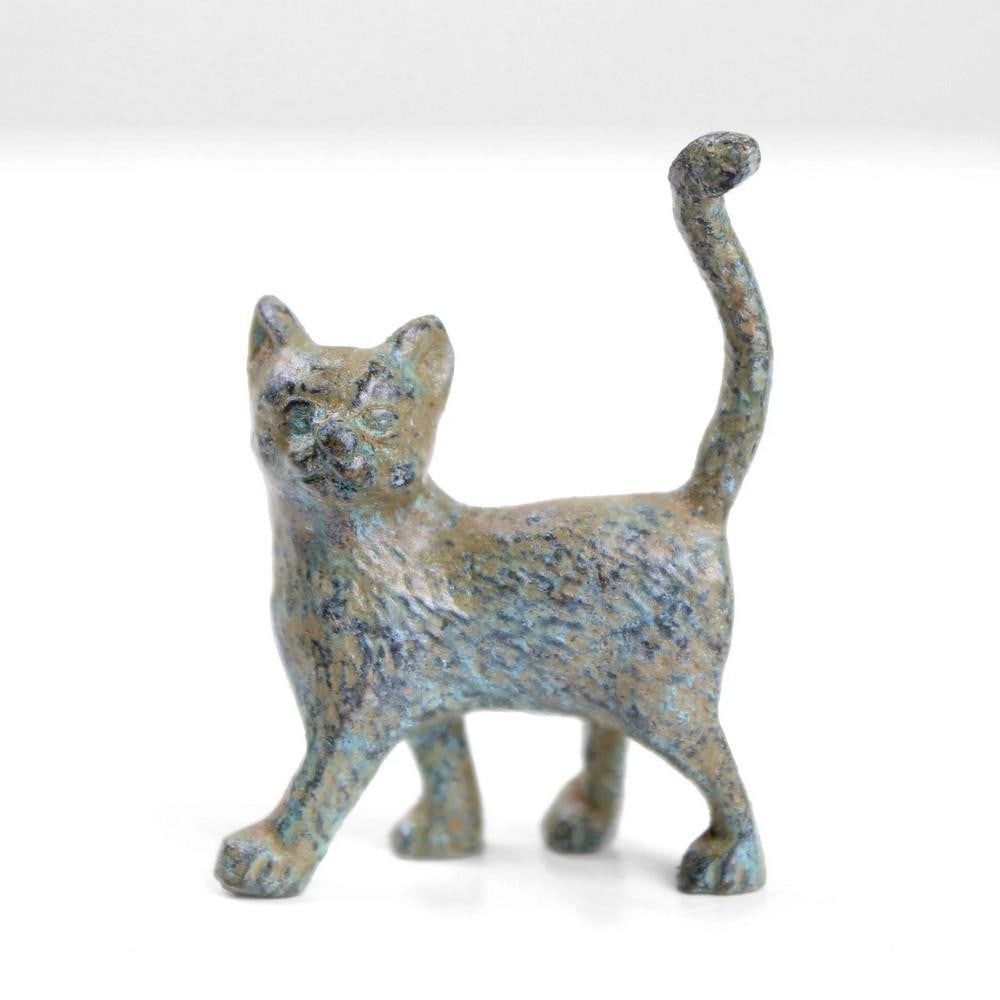 Aged Copper Walking Kitten Statuette - (0.07lbs): Aged Copper Walking Kitten Statuette - (0.07lbs) This delightful walking kitten statuette captures the playful spirit of a curious cat in motion. Crafted from copper-zinc alloy using a proprietary hot