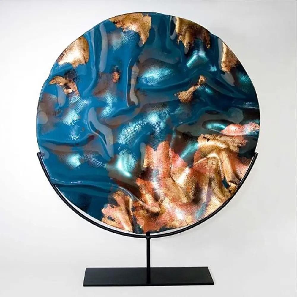 Sphere' Disc Glass Sculpture by Evans Atelier: 'Sphere' Disc Glass Sculpture by Evans Atelier Evans Atelier expands its signature disc glass sculpture range with the Sphere collection, featuring breathtaking 71 cm diameter spheres