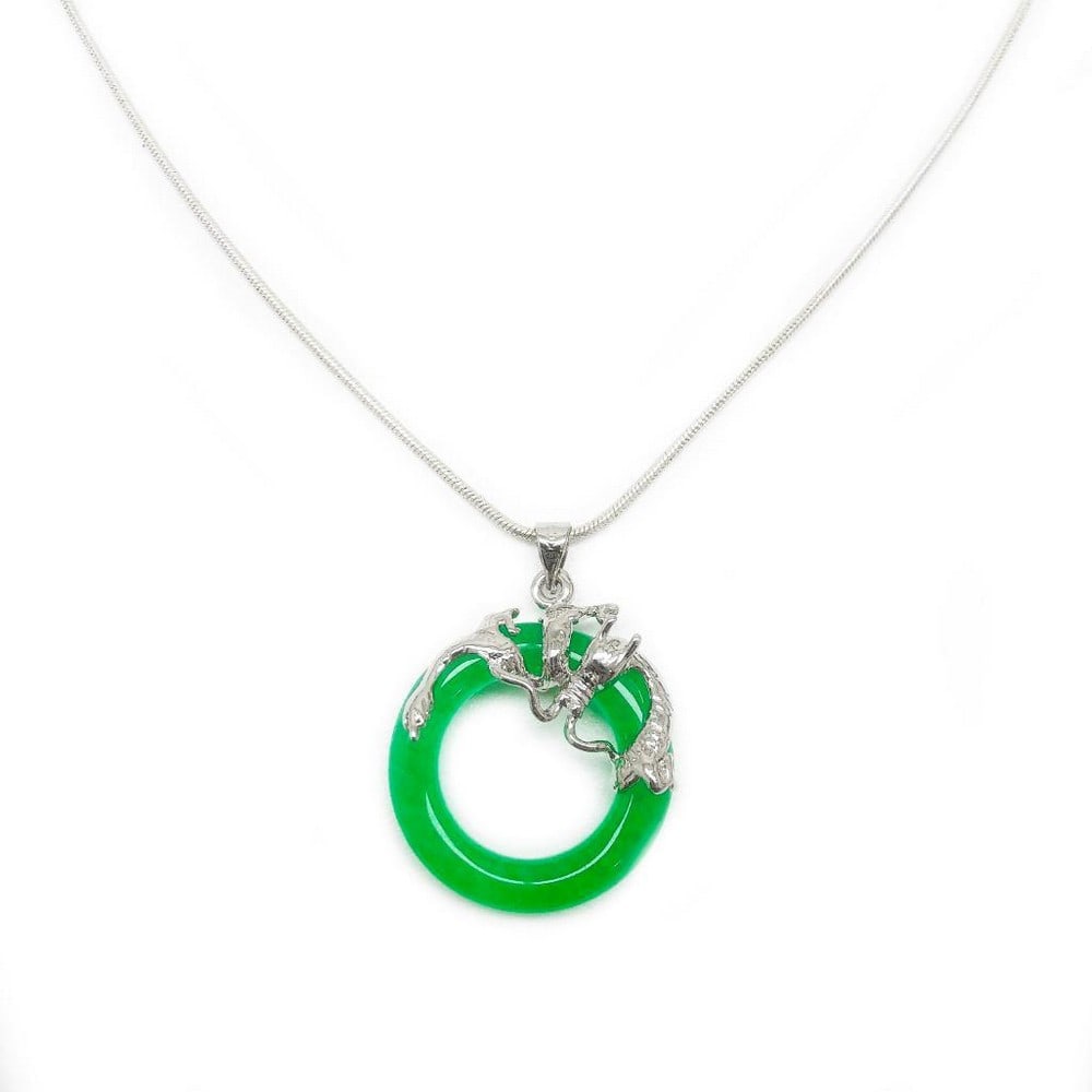 Green Jade Circle of Life Dragon Pendant with Sterling Silver Chain: Green Jade Circle of Life Dragon Pendant with Sterling Silver Chain This stunning pendant features a detailed dragon design and circle of carved green jade, encircling the symbolic “Circle of