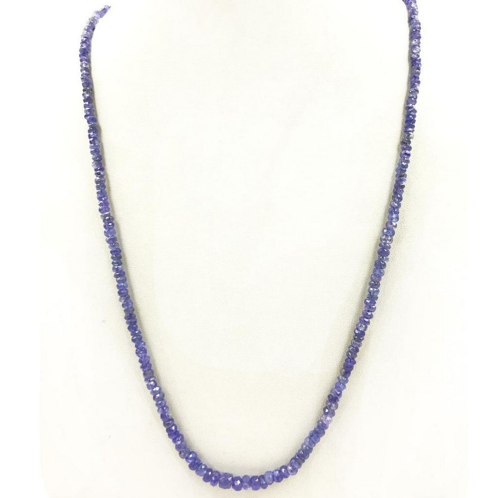 18" Tanzanite Faceted String Beaded Necklace: 18" Tanzanite Faceted String Beaded Necklace Introducing our 18" Tanzanite Faceted String Beaded Necklace, a radiant accessory that seamlessly combines sophistication with timeless allure.