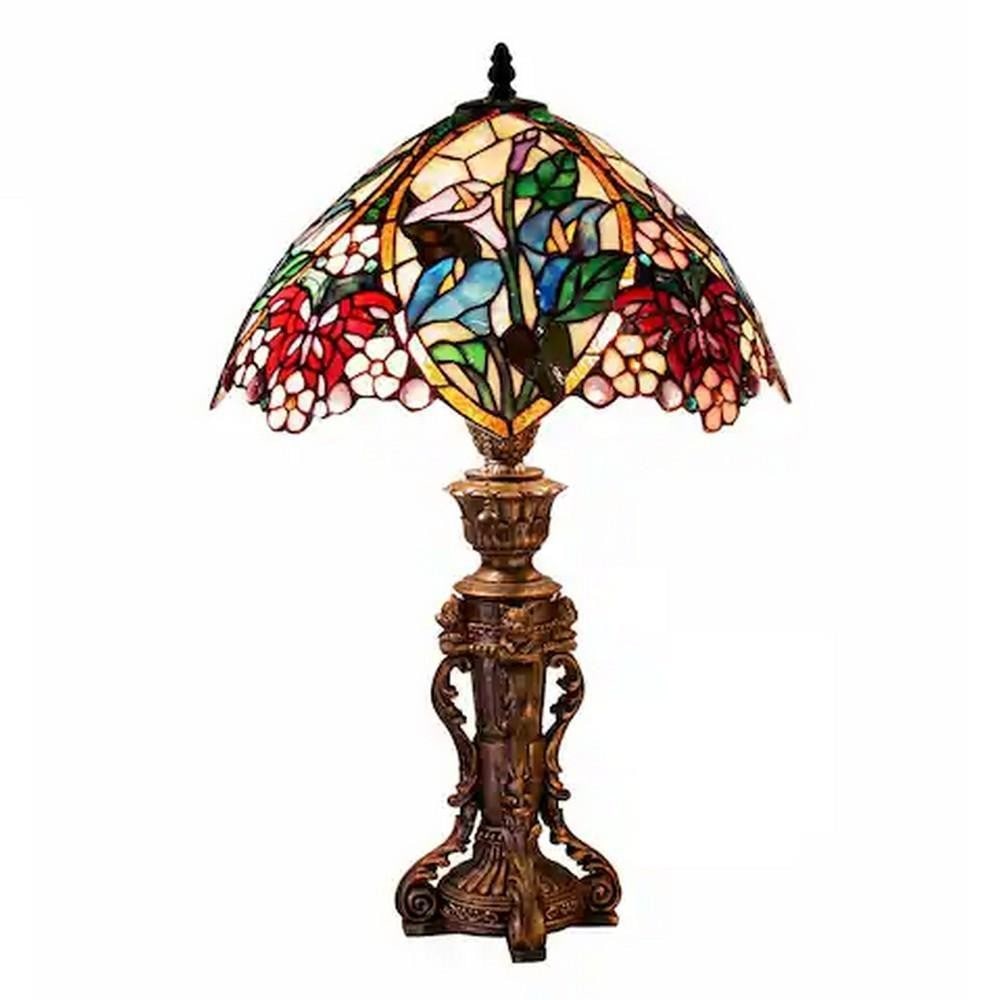 Floral Tiffany-Style Table Lamp: Floral Tiffany-Style Table Lamp The Floral Tiffany-Style Table Lamp showcases a dome-shaped stained glass shade adorned with a vibrant floral pattern in red, blue, green, and yellow hues. The intrica