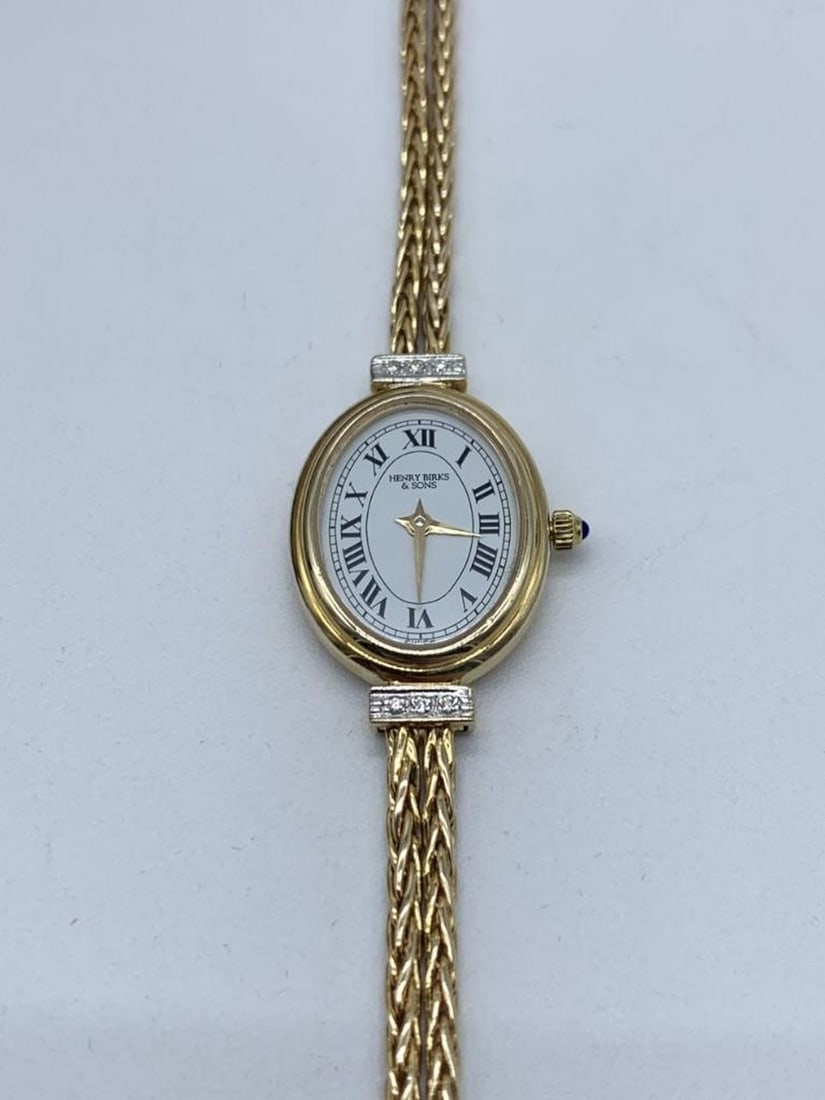A Henry Burks and Son's Saphire Crystal 14kt Gold Ladies Diamond and Double Rope Band Time Piece (1 of 8)