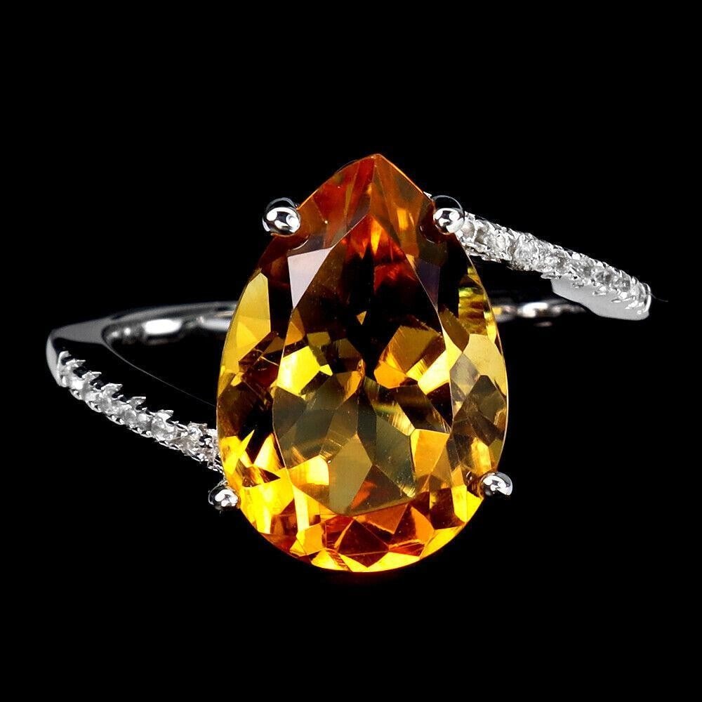 Pear Cut Yellow Citrine With White Topaz in Sterling Silver Mount Ring - Size 6: Pear Cut Yellow Citrine (13 x 9 mm) With White Topaz in Sterling Silver Mount Ring - Size 6 Metal: 925 Sterling Silver Base Metal: Fine Silver Style: Cocktail Metal Purity: 925/1000 Ring Size: