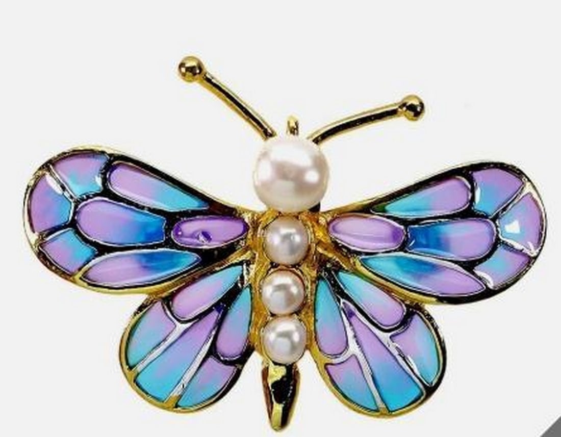 Sterling Silver Enamel Butterfly Brooch with 5mm Round Pearl: Sterling Silver Enamel Butterfly Brooch with 5mm Round Pearl This charming sterling silver brooch features a delicate enamel butterfly accented with a luminous 5mm round pearl. Designed with intricat