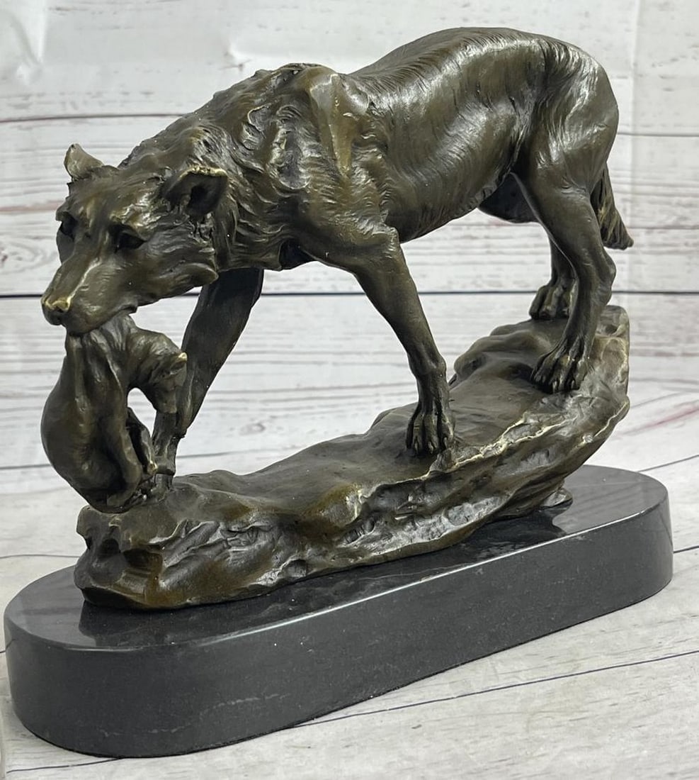 Barye Inspired Wolf Carrying Cub Bronze Sculpture - 9" x 11": Barye Inspired Wolf Carrying Cub Bronze Sculpture - 9" x 11" Mother's love is a universal concept between mankind and wildlife.She creates life and then provides, nourishes and protects i