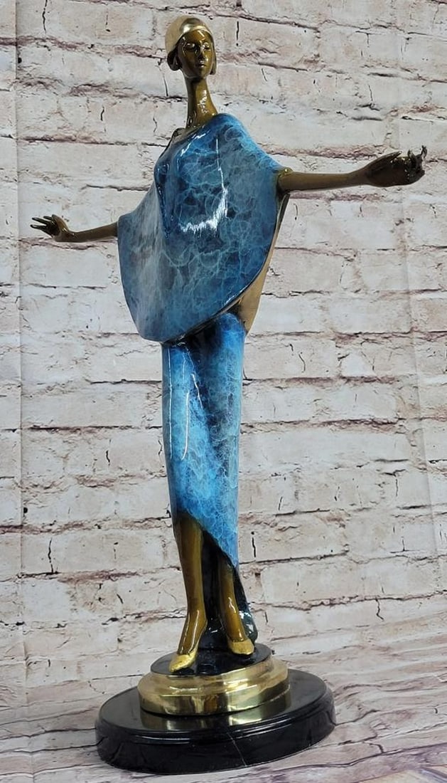 Glamorous Fashionista Bronze Sculpture Inspired by Julis Erte - 20" x 17": Glamorous Fashionista Bronze Sculpture Inspired by Julis Erte - 20" x 17" This exquisite bronze sculpture captures the essence of high fashion, featuring a striking figure standing